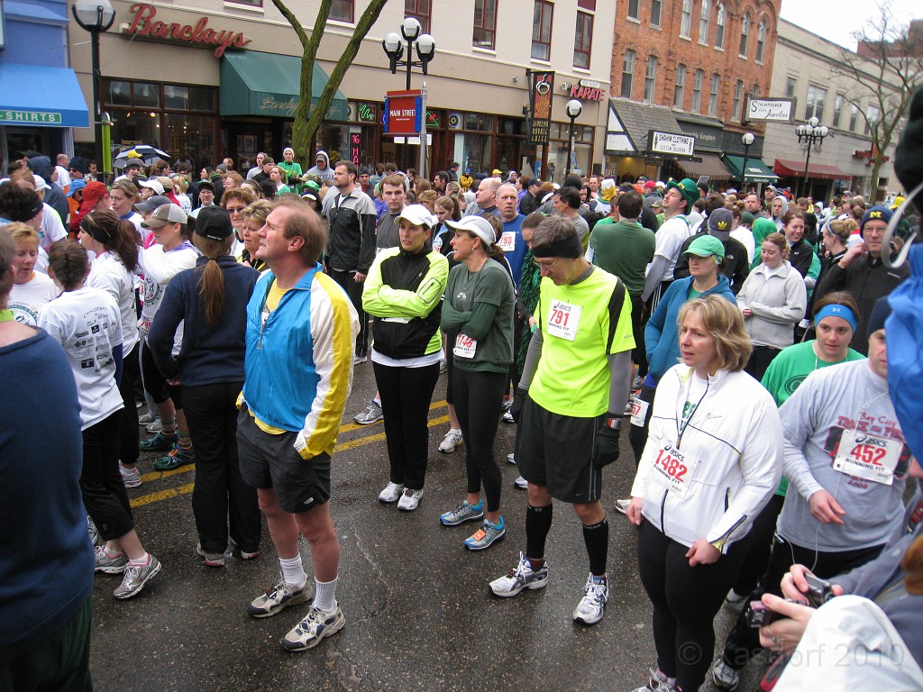 Shamrocks and Shenanigans 5K 2010 0080.jpg - The 2010 Shamrocks and Shenanigans 5K race in Ann Arbor MI. Cool and damp, and crowded. Going through the race plan mentally. Do I still have both my feet... check... shoes tied.... check... having fun.............................................check.